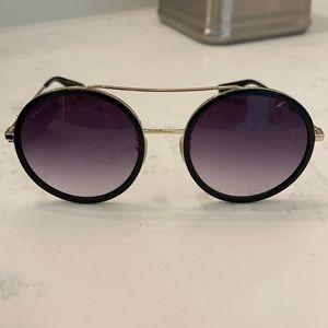 Black Gucci sunglasses with case!